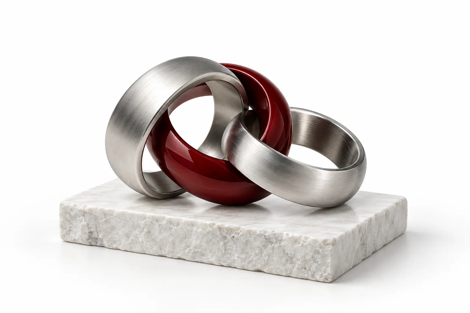 Interlinked silver and red rings representing partnership